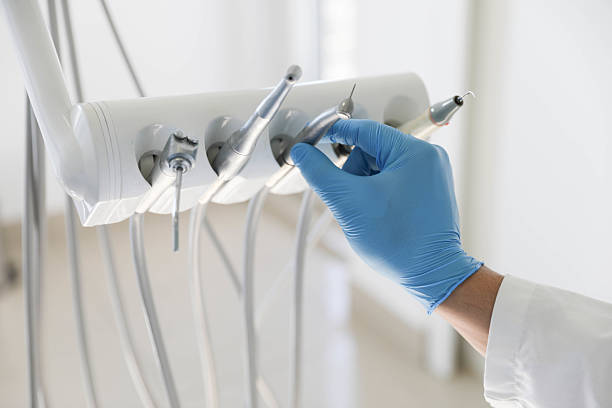 Professional Root Canal Treatment technician working in East Tawas, MI